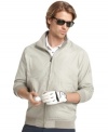 Keep your cool when you're hot on the links with this crisp microfiber jacket from Izod.