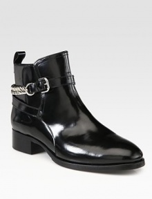 Nail your look with this leather silhouette featuring a chunky chain and wrap-around buckle strap. Stacked heel, 1¼ (30mm)Leather upperLeather lining and solePadded insoleImported Nail your look with this leather silhouette featuring a chunky chain and wrap-around buckle strap. Stacked heel, 1¼ (30mm)Leather upperLeather lining and solePadded insoleImported
