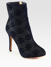 Suede ankle boot with a side zipper, towering heel and intricate leather stitching. Self-covered heel, 4 (100mm)Covered platform, ½ (15mm)Compares to a 3½ heel (90mm)Suede and leather upperSide zipperLeather lining and solePadded insoleImportedOUR FIT MODEL RECOMMENDS ordering one size up as this style runs small. Suede ankle boot with a side zipper, towering heel and intricate leather stitching. Self-covered heel, 4 (100mm)Covered platform, ½ (15mm)Compares to a 3½ heel (90mm)Suede and leather upperSide zipperLeather lining and solePadded insoleImportedOUR FIT MODEL RECOMMENDS ordering one size up as this style runs small.