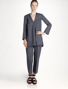 Expertly cut from crisply woven cotton, this structured tunic will instantly upgrade your wardrobe.V necklineInverted front pleatLong sleevesVented hemlineCottonDry cleanMade in ItalyModel shown is 5'10 (177cm) wearing US size 4. Expertly cut from crisply woven cotton, this structured tunic will instantly upgrade your wardrobe.V necklineInverted front pleatLong sleevesVented hemlineCottonDry cleanMade in ItalyModel shown is 5'10 (177cm) wearing US size 4.