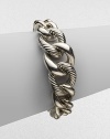 From the Chain Collection. Sterling silver in alternating smooth and twisted cable links.Sterling silver Length, about 7¼ Spring link clasp closure Imported 
