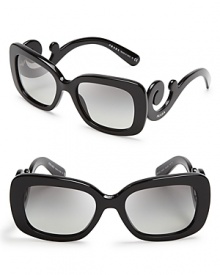 Go for Baroque in Prada's over-the-top sunglasses with statement-making arms. Go for Baroque in Prada's over-the-top sunglasses with statement-making arms.