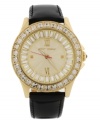 A classic boyfriend-style timepiece given a shot of glitzy glamour, by Betsey Johnson. Crafted of black leather strap and round gold tone stainless steel case. Bezel embellished with crystal accents. Textured champagne dial features ring of baguette-cut crystal accents, applied silver tone Roman numerals at twelve and six o'clock, dot markers at three and nine o'clock, luminous hour and minute hands, signature fuchsia second hand and logo at twelve o'clock. Quartz movement. Water resistant to 30 meters. Two-year limited warranty.