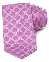 An optic floral print conforms into a grid-like pattern on a silk tie from Ike Behar.