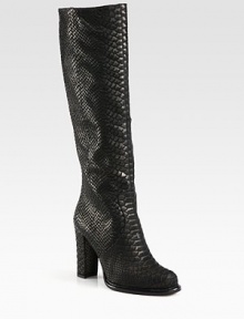 Reptile-embossed Italian leather adds textural appeal to this seasonal staple with a powerful heel. Self-covered heel, 3¾ (95mm)Shaft, 15½Leg circumference, 13½Reptile-embossed leather upperSide zipLeather liningRubber solePadded insoleMade in Italy Reptile-embossed Italian leather adds textural appeal to this seasonal staple with a powerful heel. Self-covered heel, 3¾ (95mm)Shaft, 15½Leg circumference, 13½Reptile-embossed leather upperSide zipLeather liningRubber solePadded insoleMade in Italy