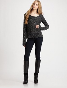 Nubby melange finished with a cable-knit stripe in a casual scoopneck silhouette.ScoopneckLong sleevesPullover styleAbout 24 from shoulder to hem88% acrylic/12% woolDry cleanImported Nubby melange finished with a cable-knit stripe in a casual scoopneck silhouette.ScoopneckLong sleevesPullover styleAbout 24 from shoulder to hem88% acrylic/12% woolDry cleanImported