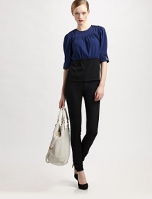 A brand new classic, this feminine top features feminine gathered details and a touch of on-trend colorblocking.Round collarElbow-length sleevesButtons on shouldersFront and back yokeAbout 23 from shoulder to hem82% triacetate/18% polyesterDry cleanImported Model shown is 5'9½ (176cm) wearing US size 4. A brand new classic, this feminine top features feminine gathered details and a touch of on-trend colorblocking.Round collarElbow-length sleevesButtons on shouldersFront and back yokeAbout 23 from shoulder to hem82% triacetate/18% polyesterDry cleanImported Model shown is 5'9½ (176cm) wearing US size 4.