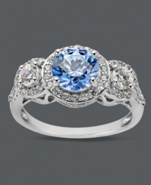 Elegance defined. Arabella's stunning three stone ring highlights a round-cut blue Swarovski zirconia (2-1/4 ct. t.w.) and dozens of round-cut white zirconias (1-1/8 ct. t.w.). Crafted in sterling silver. Size 7. Elegance defined. Arabella's stunning three stone ring highlights a round-cut blue Swarovski zirconia (2-1/4 ct. t.w.) and dozens of round-cut white zirconias (1-1/8 ct. t.w.). Crafted in sterling silver. Size 7.