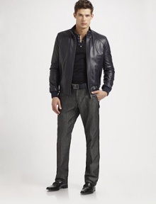 A new way to wear denim, tailored with a trouser-style fit and an addition of Lycra for a smoother drape and crisp crease. Side slash, back welt pockets Inseam, about 32 68% cotton/32% Lycra Dry clean Imported 
