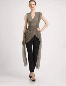 Crisp pleats and a slim silhouette define this impeccably tailored style.Self waistbandZip flyFront pleatsBack button welt pocketsSilk liningInseam, about 3475% viscose/25% silkDry cleanMade in ItalyModel shown is 5'10 (177cm) wearing US size 4.This style runs true to size. We recommend ordering your usual size for a standard fit. Crisp pleats and a slim silhouette define this impeccably tailored style.Self waistbandZip flyFront pleatsBack button welt pocketsSilk liningInseam, about 3475% viscose/25% silkDry cleanMade in ItalyModel shown is 5'10 (177cm) wearing US size 4.This style runs true to size. We recommend ordering your usual size for a standard fit.