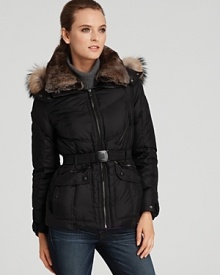 Andrew Marc brings you cold weather style without the bulk in this belted down coat, complete with a luxurious fur-trimmed hood and collar. Andrew Marc brings you cold weather style without the bulk in this belted down coat, complete with a luxurious fur-trimmed hood and collar.