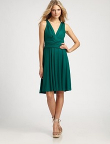 Soft, fluid jersey, tailored with a flattering full skirt and a plunging neckline.Surplice necklineSleevelessRuched waistbandGathered skirtFully linedAbout 37¾ from shoulder to hem93% lyocell/7% elastaneDry cleanImportedModel shown is 5'10½ (179cm) wearing US size Small. Soft, fluid jersey, tailored with a flattering full skirt and a plunging neckline.Surplice necklineSleevelessRuched waistbandGathered skirtFully linedAbout 37¾ from shoulder to hem93% lyocell/7% elastaneDry cleanImportedModel shown is 5'10½ (179cm) wearing US size Small.