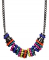 A palette that pops. Nine West's multicolored design catches the eye with funky and bright plastic beadwork set in hematite-plated mixed metal. Approximate length: 16 inches + 1-1/2-inch extender.