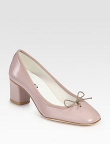 Grosgrain ribbon trim and bow add a hint of texture to this leather look. Self-covered heel, 2 (50mm)Glazed leather and grosgrain ribbon upperLeather lining and solePadded insoleMade in FranceOUR FIT MODEL RECOMMENDS ordering one size up as this style runs small. Grosgrain ribbon trim and bow add a hint of texture to this leather look. Self-covered heel, 2 (50mm)Glazed leather and grosgrain ribbon upperLeather lining and solePadded insoleMade in FranceOUR FIT MODEL RECOMMENDS ordering one size up as this style runs small.