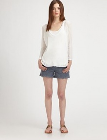 Semi-sheer, cotton-rich top has a plunging v-neck, split hi-low hem and dramatic dolman sleeves. Plunging v-neckDropped shouldersLong dolman sleevesSplit hi-low hem60% cotton/40% polyesterMachine washMade in USA of imported fabricModel shown is 5'10 (177cm) wearing US size Small. Semi-sheer, cotton-rich top has a plunging v-neck, split hi-low hem and dramatic dolman sleeves. Plunging v-neckDropped shouldersLong dolman sleevesSplit hi-low hem60% cotton/40% polyesterMachine washMade in USA of imported fabricModel shown is 5'10 (177cm) wearing US size Small.