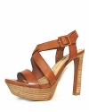 A leather covered buckle and stacked sole lend luxe detail to Luxury Rebel's Chantal sandals.