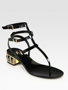 Lacquered, adjustable PVC straps accompany a rhinestone-embellished heel and classic thong front. Rhinestone-studded PVC heel, 1 (25mm)PVC upperRubber soleMade in ItalyOUR FIT MODEL RECOMMENDS ordering true whole size; ½ sizes should order the next whole size down. 
