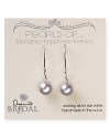 A delicate freshwater pearl is a perfectly understated touch on these earrings Dogeared. Designed to lend sweet sophistication to your aisle style, this pair is a total yes.