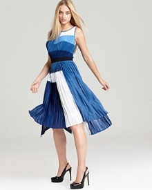 Intricately pleated, this showstopping BCBGMAXAZRIA dress perfects the color-block trend in rich blue hues. Intricately pleated, this showstopping BCBGMAXAZRIA dress perfects the color-block trend in rich blue hues.
