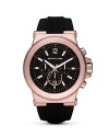 A bold black dial is framed by a rose-gold tone bezel in this chic quartz timepiece from MICHAEL Michael Kors.