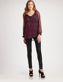 Semi-sheer blouse of silk chiffon in a vivacious paisley print with ruffle trim and billowy sleeves. Ruffled v-neckLong sleeves with ruffled cuffsLonger length hits below the hipsSilk chiffonDry cleanImportedModel shown is 5'11 (178cm) wearing US size Small. Semi-sheer blouse of silk chiffon in a vivacious paisley print with ruffle trim and billowy sleeves. Ruffled v-neckLong sleeves with ruffled cuffsLonger length hits below the hipsSilk chiffonDry cleanImportedModel shown is 5'11 (178cm) wearing US size Small.