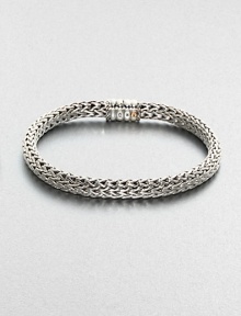 An intricately woven design,from the Bedeg Collection, set in sterling silver and 18kt-gold.Sterling silver/18kt-goldAbout 3 diam.Imported An intricately woven design,from the Bedeg Collection, set in sterling silver and 18kt-gold.Sterling silver/18kt-goldAbout 3 diam.Imported