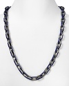 Take your jewel box in an industrial direction with MARC BY MARC JACOBS' chain-link necklace. With bold hematite and enamel links, this piece adds instant tough-chic.