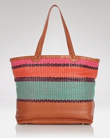 Bold stripes in a rich palette make this woven leather tote from Rebecca Minkoff summer's must-have bag. Ideally sized for the work-to-weekend essentials, it's a terrifically textured way to carry on all season long. Bold stripes in a rich palette make this woven leather tote from Rebecca Minkoff summer's must-have bag. Ideally sized for the work-to-weekend essentials, it's a terrifically textured way to carry on all season long.