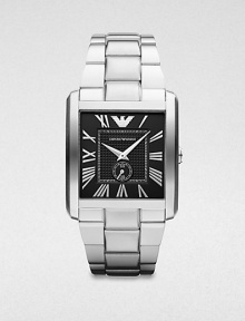 A classic timepiece with distinctive features in sleek stainless steel. Quartz movementWater resistant to 5 ATMRectangular stainless steel case, 34.5mm (1.3) X 36.5mm (1.4)Smooth bezelBlack dialRoman numeral hour markersSecond hand sub-dialStainless steel link braceletImported A classic timepiece with distinctive features in sleek stainless steel. Quartz movementWater resistant to 5 ATMRectangular stainless steel case, 34.5mm (1.3) X 36.5mm (1.4)Smooth bezelBlack dialRoman numeral hour markersSecond hand sub-dialStainless steel link braceletImported