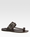Classic leather sandal with signature horsebit detail.Leather upperRubber soleMade in ItalyOUR FIT MODEL RECOMMENDS ordering one size down as this style runs large. 