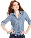 Confess infuses playful spirit into the trend-hot chambray top, equipping this style with polka-dots and a cute, tie-it-up hem.