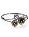 Judith Jack's bejeweled bangle lends dark glamour to your look.