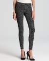 Channel your wild side in HUE leopard-print leggings with back pockets and two animal-inspired colors.