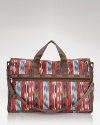 Updated in a bold print, LeSportsac's do-it-all duffel bag is crafted from nylon to be your trusty travel companion.