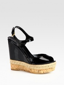 Combination wedge made of patent, natural cord, cork and logo-embossed leather. Embossed leather and cork wedge with rope edging, 5 (125mm)Cork platform with rope edging, 1½ (40mm)Compares to a 3½ heel (90mm)Patent leather upperAdjustable ankle strapLeather liningRubber solePadded insoleMade in Italy Combination wedge made of patent, natural cord, cork and logo-embossed leather. Embossed leather and cork wedge with rope edging, 5 (125mm)Cork platform with rope edging, 1½ (40mm)Compares to a 3½ heel (90mm)Patent leather upperAdjustable ankle strapLeather liningRubber solePadded insoleMade in Italy