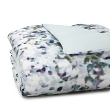 A light and lovely abstract water lily pattern in emerald green, lavender and navy breathes sweet dreams into this HUGO BOSS duvet cover. The reverse side's a cozy textured solid seafoam green. A light and lovely abstract water lily pattern in emerald green, lavender and navy breathes sweet dreams into this HUGO BOSS duvet cover. The reverse side's a cozy textured solid seafoam green.