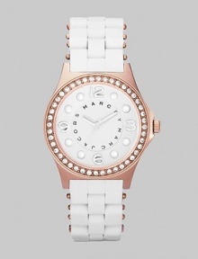 A sleek, understated timepiece with rose goldplated accents and wrapped stainless steel bracelet.Quartz movement Water resistant to 3 ATM Crystal bezel Rose goldplated stainless steel round case, 36.5mm, (1.43) White dial with concave ring Rose goldplated numeral and dot hour markers Second hand Silicon wrapped stainless steel bracelet, 18mm, (.71) Imported A sleek, understated timepiece with rose goldplated accents and wrapped stainless steel bracelet.Quartz movement Water resistant to 3 ATM Crystal bezel Rose goldplated stainless steel round case, 36.5mm, (1.43) White dial with concave ring Rose goldplated numeral and dot hour markers Second hand Silicon wrapped stainless steel bracelet, 18mm, (.71) Imported