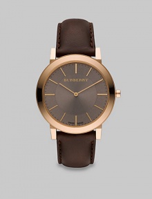 A super-slim taupe dial with sapphire crystal and rose gold detail on a smooth leather strap. Round bezel Quartz movement Date function at 6 o'clock Second hand Water resistant to 3 ATM Stainless steel case: 40mm (1.57) Leather strap: 20mm (0.79) Made in Switzerland A super-slim taupe dial with sapphire crystal and rose gold detail on a smooth leather strap. Round bezel Quartz movement Date function at 6 o'clock Second hand Water resistant to 3 ATM Stainless steel case: 40mm (1.57) Leather strap: 20mm (0.79) Made in Switzerland