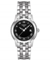 A stately watch with international appeal, by Tissot. Stainless steel bracelet and case. Etched black dial with logo, date window and silvertone roman numerals. Swiss made. Quartz movement. Water resistant to 30 meters. Two-year warranty.