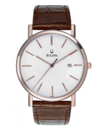 A clean, traditional timepiece from Bulova. Brown croc-embossed leather strap and rose-colored stainless steel case. Minimalist white dial with logo and thin rose-colored indexes and indicators. Three hands. Quartz movement. Water resistant to 30 meters. Three-year limited warranty. A clean, traditional timepiece from Bulova. Brown croc-embossed leather strap and rose-colored stainless steel case. Minimalist white dial with logo and thin rose-colored indexes and indicators. Three hands. Quartz movement. Water resistant to 30 meters. Three-year limited warranty.