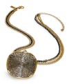 Haute to handle. This pendant necklace from INC International Concepts is crafted from gold- and hematite-tone mixed metal with glass crystal accents giving it a stylish touch. Approximate length: 18 inches + 2-inch extender. Approximate drop: 2 inches.