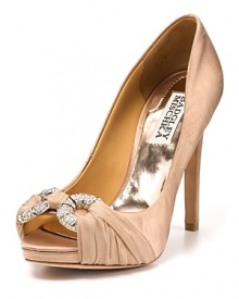 Sophisticated satin makes the Janni pumps a prime candidate for evening affairs. From Badgley Mischka. Sophisticated satin makes the Janni pumps a prime candidate for evening affairs. From Badgley Mischka.