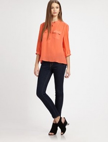 An elegantly tailored blouse shaped with soft pleating at the shoulders, all in sumptuous silk georgette.Band collarButton-down placketThree-quarter sleevesChest pocketsStraight hemSlightly gathered backAbout 25 from shoulder to hemSilkDry cleanImportedModel shown is 5'10 (177cm) wearing US size Small. An elegantly tailored blouse shaped with soft pleating at the shoulders, all in sumptuous silk georgette.Band collarButton-down placketThree-quarter sleevesChest pocketsStraight hemSlightly gathered backAbout 25 from shoulder to hemSilkDry cleanImportedModel shown is 5'10 (177cm) wearing US size Small.