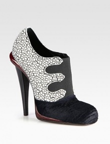Floral-print felt is at the center of this raised silhouette, mixed with lush calf hair, leather trim and comfortable elastic paneling. Stacked heel, 4½ (115mm)Felt and calf hair upper with leather trim and elastic panelingLeather lining and solePadded insoleMade in Italy