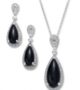 Droplets of black onyx (7-1/2 ct. t.w.) are surrounded by bands of tiny diamonds for an utterly graceful set that is ideal for wearing to any formal gathering. Approximate length (necklace): 18 inches. Approximate drop (pendant): 1-1/4 inch. Approximate earring drop: 1 inch.