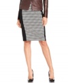 Sophisticated houndstooth alternates with solid panels to give this MICHAEL Michael Kors pencil skirt a fresh, modern feel. Classic pumps keep it polished for work while statement heels give it the right look for a night out.