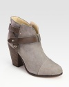 Buttery nubuck leather look with contrasting trim and a sleek wrap-around buckle strap. Stacked heel, 3½ (90mm)Nubuck leather upperLeather lining and solePadded insoleImportedOUR FIT MODEL RECOMMENDS ordering one size up as this style runs small. 