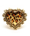 Wild at heart. Betsey Johnson spotlights an exotic leopard-print pattern in this heart-shaped crystal stretch cocktail ring. Outlined with delicate bow details, it's crafted in gold tone mixed metal. Includes a signature gift box. Ring stretches to fit finger.