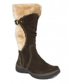 Bare Traps' Ellery boots are an effortless way to ensure warmth and comfort this winter. Made in suede and shearling with a round-toe shape and inside zipper closure, they feature shearling embellishment on the sides and at the cuff. Bare Traps' Ellery boots are an effortless way to ensure warmth and comfort this winter. Made in suede and shearling with a round-toe shape and inside zipper closure, they feature shearling embellishment on the sides and at the cuff.