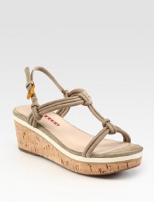 Suede t-strap design with cork wedge and micro detail. Cork and micro wedge, 2 (50mm)Cork and micro platform, 1 (25mm)Compares to a 1 heel (25mm)Suede upperAdjustable slingback strapLeather liningRubber solePadded insoleImported Suede t-strap design with cork wedge and micro detail. Cork and micro wedge, 2 (50mm)Cork and micro platform, 1 (25mm)Compares to a 1 heel (25mm)Suede upperAdjustable slingback strapLeather liningRubber solePadded insoleImported